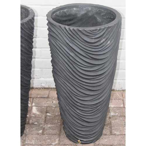 354 - A pair of black fiberglass planters of wavy textured form, approx 39cm x 75cm