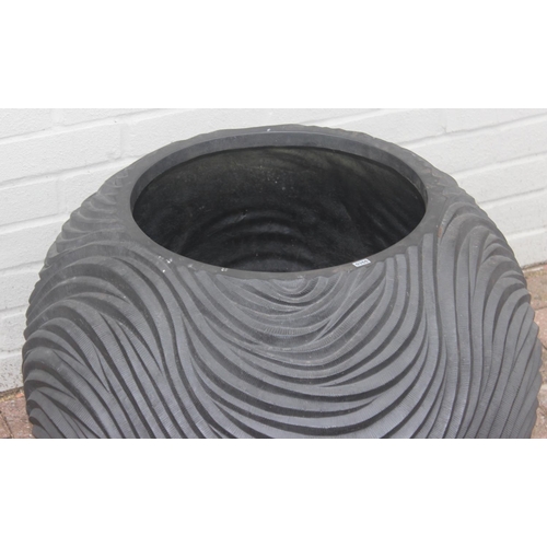 355 - A pair of black fiberglass boat shaped planters of wavy textured form, each approx 74cm x 24cm x 26c... 