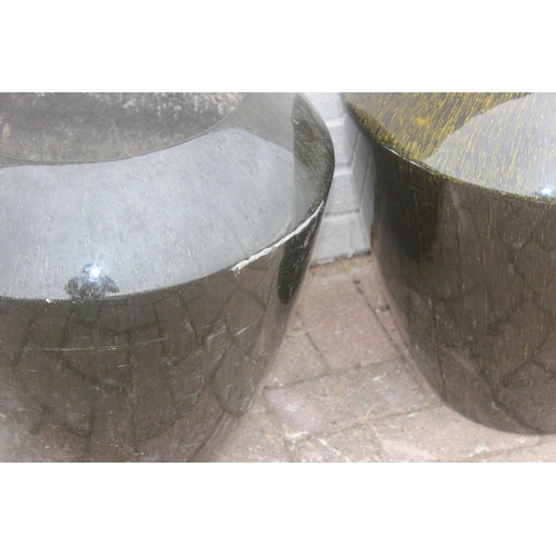 358 - A pair of black streaky glaze effect fiberglass garden planters, each approx 50cm x 52cm tall