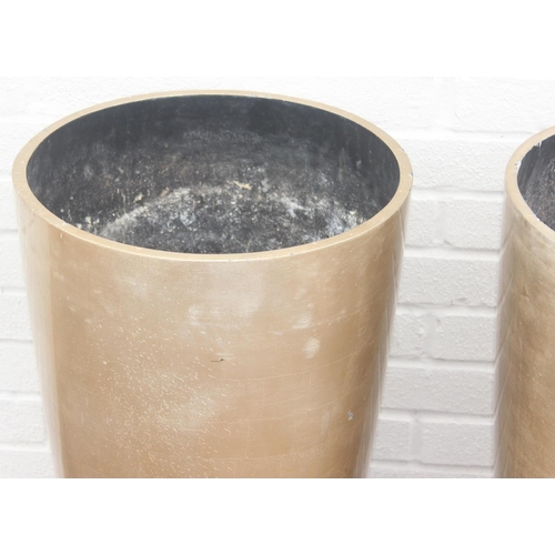 360 - A pair of distressed silver, champagne coloured fiberglass garden pot of inverted conical form, appr... 