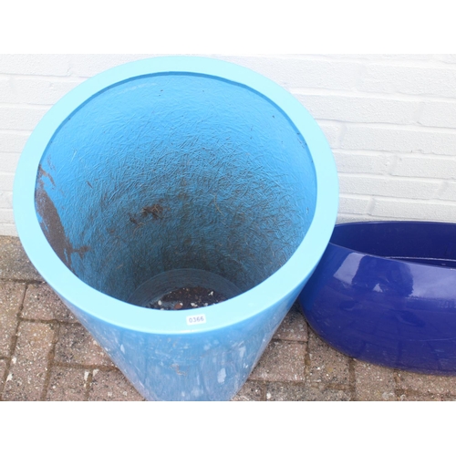 366 - 4 blue fiberglass or plastic garden planters of various forms, the largest approx 40cm in diameter x... 