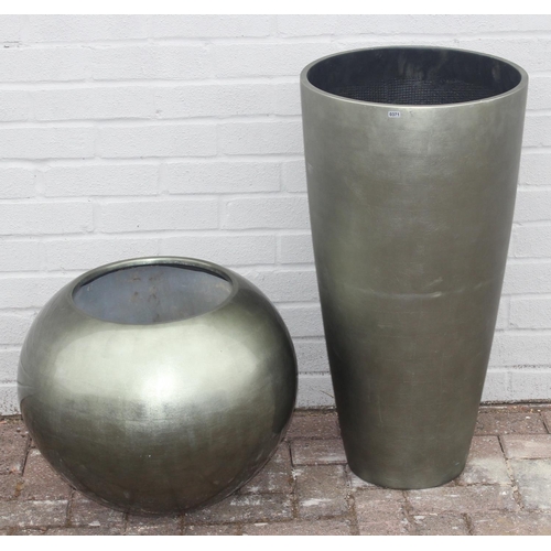 371 - 2 champagne coloured fiberglass or plastic garden planters of various forms, the largest approx 39cm... 