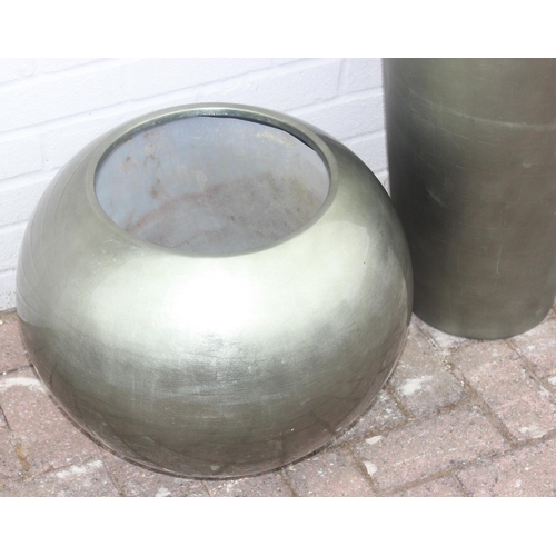 371 - 2 champagne coloured fiberglass or plastic garden planters of various forms, the largest approx 39cm... 