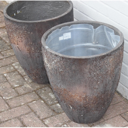 372 - A pair of interesting textured garden planters of circular tapered form, each approx 43cm in diamete... 