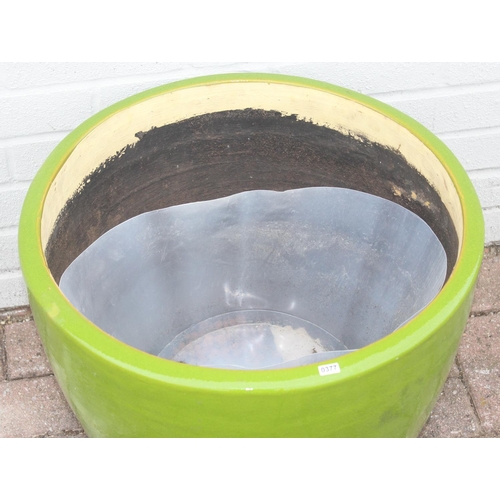 377 - A lime green glazed and brown banded ceramic garden pot, approx 51cm in diameter x 40cm tall