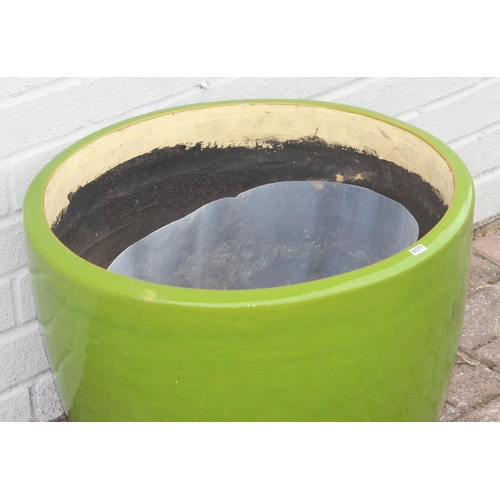 377 - A lime green glazed and brown banded ceramic garden pot, approx 51cm in diameter x 40cm tall