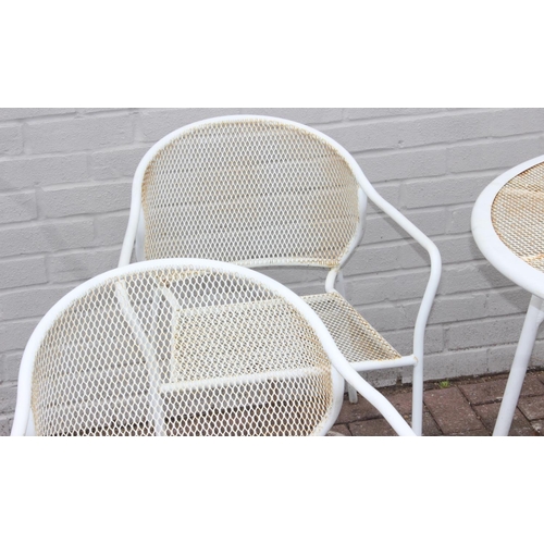 382 - A white painted wirework garden table and 4 chairs, the table approx 100cm in diameter x 72cm tall