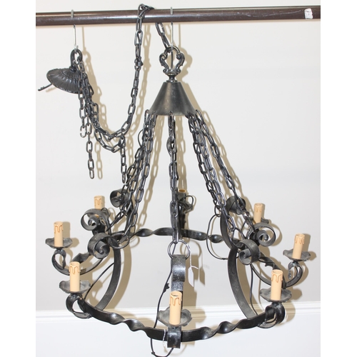 238 - A large 8 branch wrought iron hanging chandelier, approx 90cm in diameter, approx drop 167cm