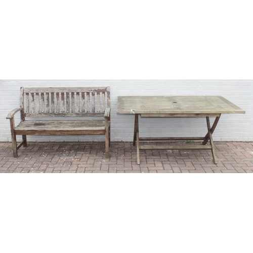 386 - Teak garden table, approx 160cm x 105 x 75cm, and a wooden garden bench (2)