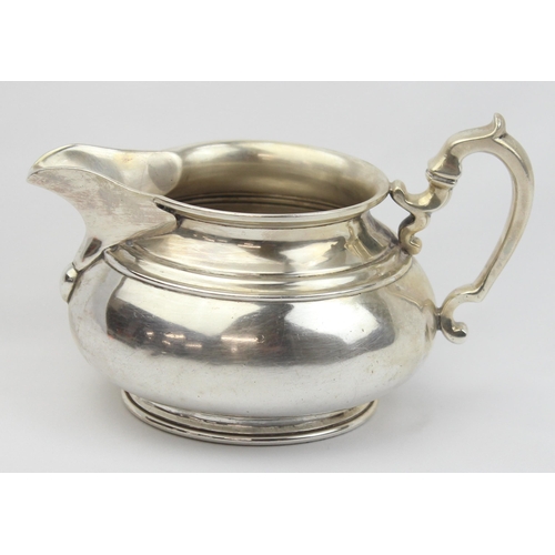 1002 - A vintage silver 2 handled milk or cream jug, London 1932 by Edward Barnard & Sons Ltd, approx 14cm ... 