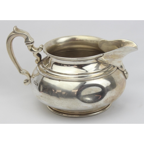 1002 - A vintage silver 2 handled milk or cream jug, London 1932 by Edward Barnard & Sons Ltd, approx 14cm ... 