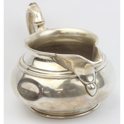 1002 - A vintage silver 2 handled milk or cream jug, London 1932 by Edward Barnard & Sons Ltd, approx 14cm ... 