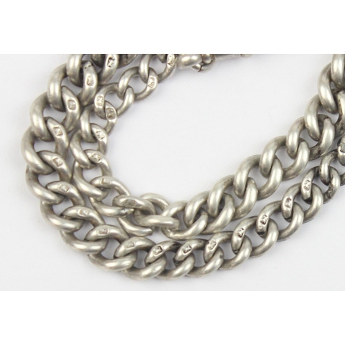 1016 - A long graduated silver albert watch chain, each link marked and the T-Bar marked for 1899, approx 3... 