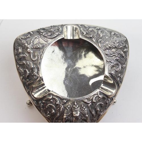 1026 - A vintage Siamese silver ashtray with embossed decoration, approx 10cm wide, marked Siam Sterling an... 