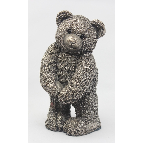 1028 - A vintage silver filled teddy bear, hallmarks for Birmingham 2000, approx 10cm tall