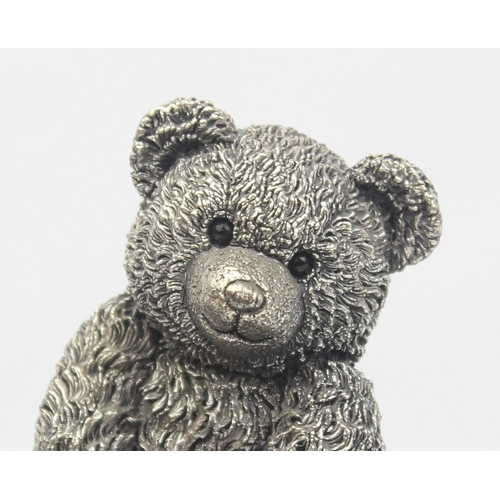 1028 - A vintage silver filled teddy bear, hallmarks for Birmingham 2000, approx 10cm tall