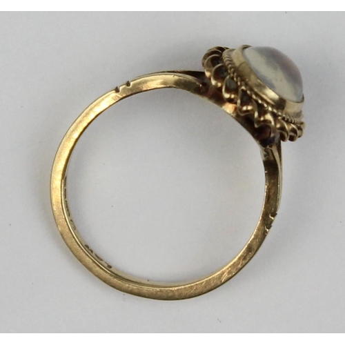 1110 - A 9ct gold and cabochon moonstone ring, marked and XRF confirmed, approx size N, approx 2.51g gross