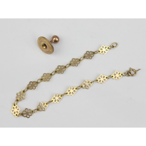 1111 - A 9ct gold floral bracelet with broken clasp and a 9ct gold shirt stud, approx 3.49g gross