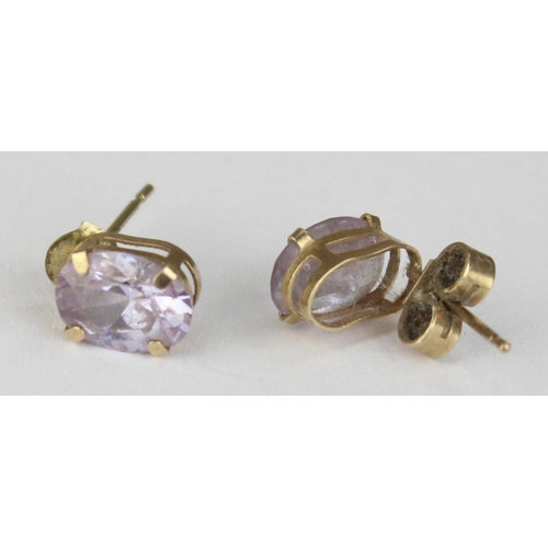 1113 - A pair of 9ct gold and amethyst stud earrings, seemingly unmarked but XRF tested as 9ct gold, approx... 