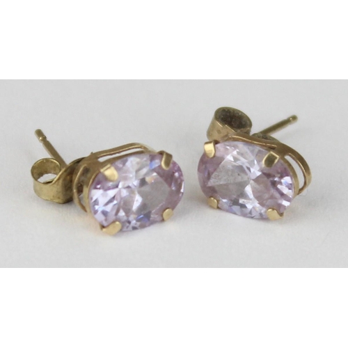 1113 - A pair of 9ct gold and amethyst stud earrings, seemingly unmarked but XRF tested as 9ct gold, approx... 