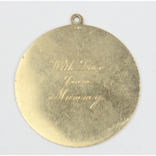 1123 - A 14ct gold engraved pendant, marked 14k and XRF confirmed, approx 32mm in diameter, approx 6.61g gr... 