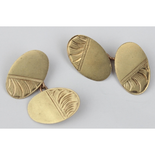 1126 - A pair of 9ct gold engraved oval cufflinks, marked for London 1963, approx 4.86g gross, presented in... 