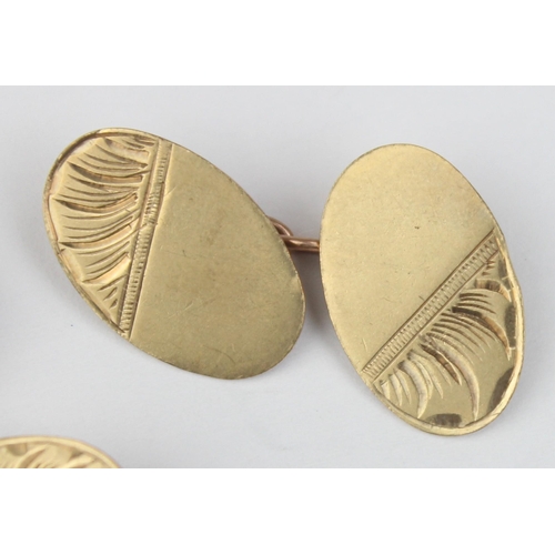 1126 - A pair of 9ct gold engraved oval cufflinks, marked for London 1963, approx 4.86g gross, presented in... 