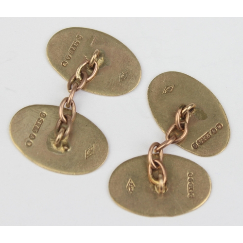 1126 - A pair of 9ct gold engraved oval cufflinks, marked for London 1963, approx 4.86g gross, presented in... 