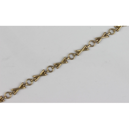 1129 - A vintage 9ct gold XO designed bracelet, marked and XRF confirmed, approx 19cm long, approx 4.38g gr... 