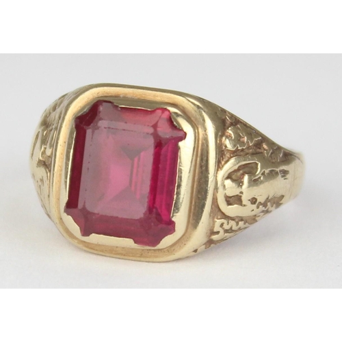 1144 - A vintage 9ct gold signet ring set with large pink stone and engraved shoulders, marked 9ct and XRF ... 