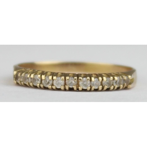 1146 - A 14ct yellow gold and white stone half eternity ring, likely diamonds but too small to test, marked... 