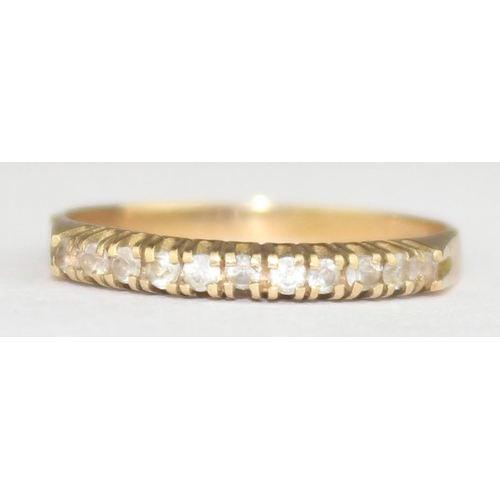 1146 - A 14ct yellow gold and white stone half eternity ring, likely diamonds but too small to test, marked... 