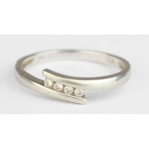 1148 - A 9ct white gold and 4 diamond ring in retro crossover setting, marked and XRF confirmed, approx siz... 