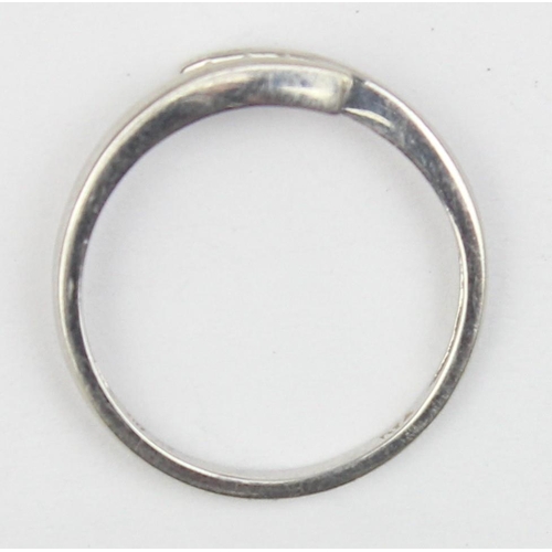 1148 - A 9ct white gold and 4 diamond ring in retro crossover setting, marked and XRF confirmed, approx siz... 