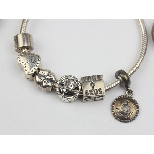 1155 - A genuine Pandora silver charm bracelet with 5 charms to inc Star Wars & Las Vegas related and 3 925... 