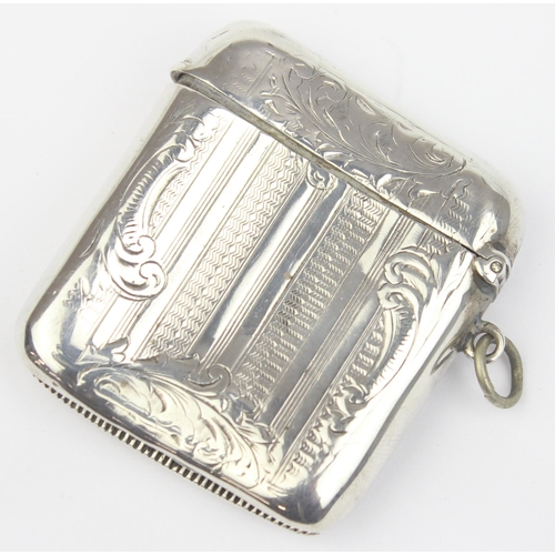 1007 - An antique silver vesta case with engraved decoration, Birmingham 1904 by William Neale, approx 30.4... 