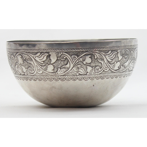 1025 - A rounded bottom silver bowl with floral scroll decoration, seemingly unmarked but XRF confirmed as ... 