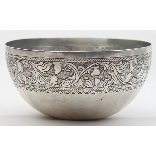 1025 - A rounded bottom silver bowl with floral scroll decoration, seemingly unmarked but XRF confirmed as ... 