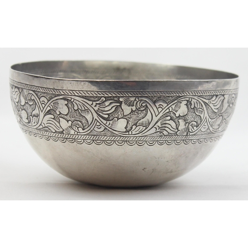 1025 - A rounded bottom silver bowl with floral scroll decoration, seemingly unmarked but XRF confirmed as ... 