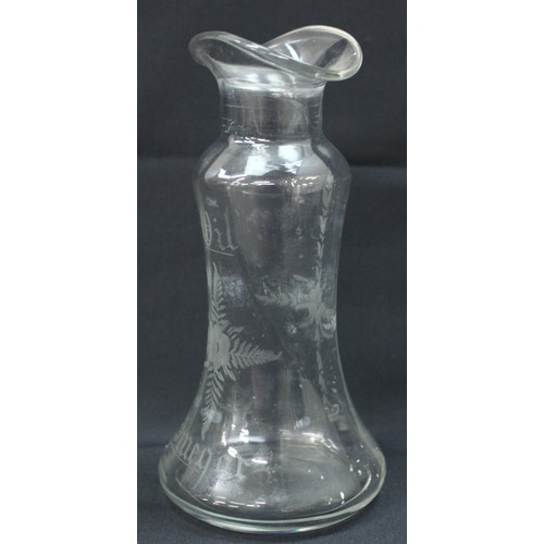 1027 - An antique silver topped oil and vinegar bottle, the glass body with engraved decoration, the top ma... 