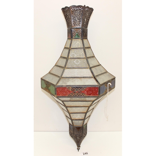 240 - A large Moroccan style hanging lamp with colourful glass panels and metal frame, approx 70cm tall