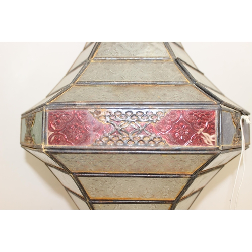 240 - A large Moroccan style hanging lamp with colourful glass panels and metal frame, approx 70cm tall