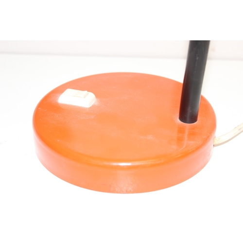 241 - A retro orange desk lamp, seemingly unmarked, approx 40cm tall as photographed