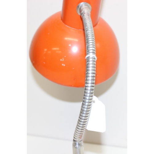 241 - A retro orange desk lamp, seemingly unmarked, approx 40cm tall as photographed