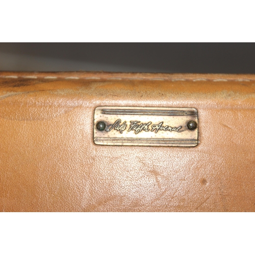 273 - A genuine Louis Vuitton leather and monogrammed suitcase, inscribed in gilt 'DE