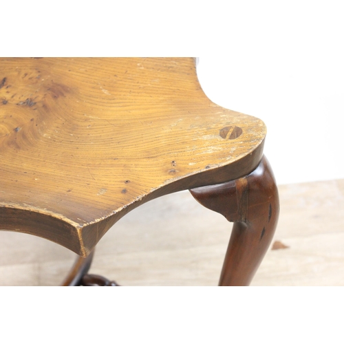 89 - A vintage Stewart Linford style elm seated saddle seated stool, unsigned, approx 39cm wide x 35cm de... 