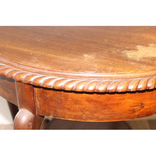 144 - An Edwardian mahogany side table of circular form with rope twist border, approx 63cm in diameter x ... 