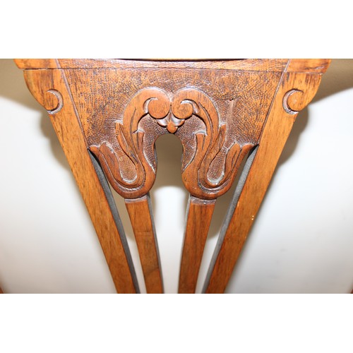 194 - A set of 4 mahogany dining chairs floral pattern seats, each approx 110cm tall