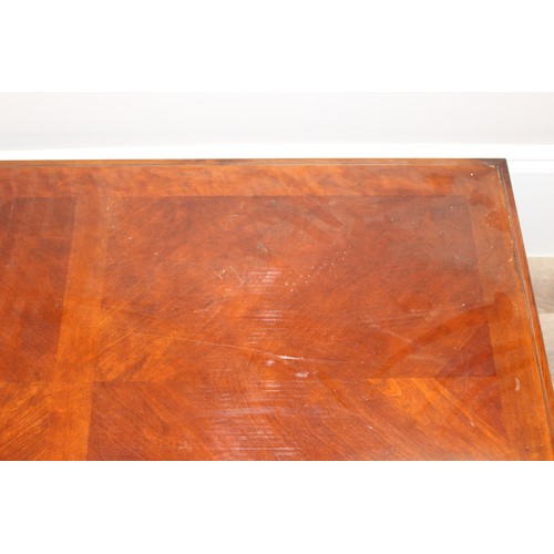 195 - A good quality modern mahogany coffee table, approx 122cm wide x 70cm deep x 48cm tall