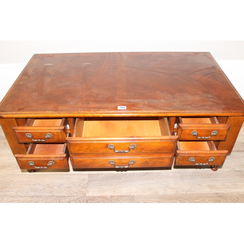 195 - A good quality modern mahogany coffee table, approx 122cm wide x 70cm deep x 48cm tall